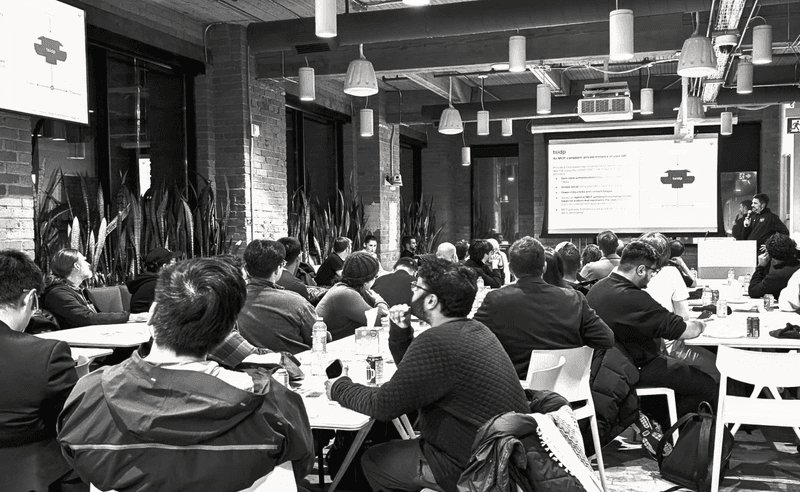 A black and white photo of a Tailscale community event